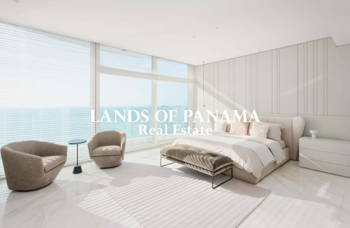 Bright master bedroom with panoramic ocean views and natural light PH The Towers Panama