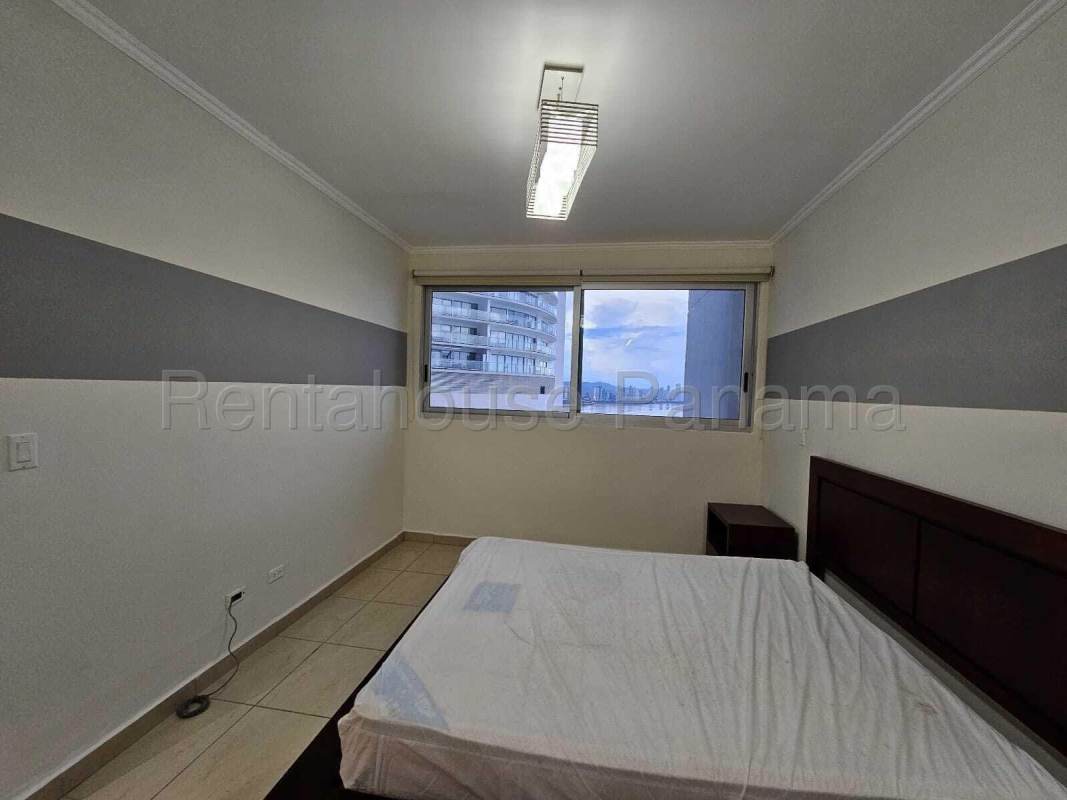 Bedroom large window city ocean views Oasis on the Bay Punta Pacifica Panama