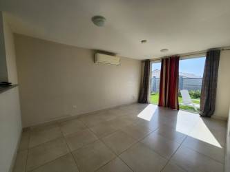 Bright living room with ceramic tile floor air conditioning Villamarina II Playa Dorada