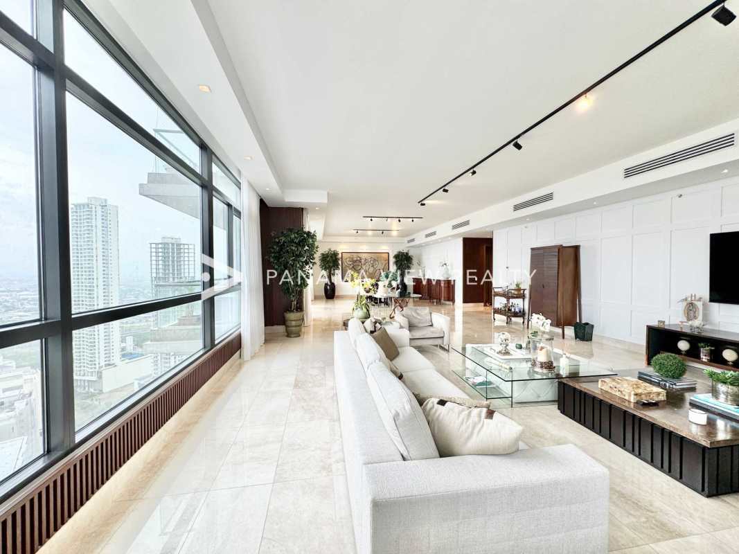 White luxury kitchen with quartz island, stainless appliances, marble floors in PH Albatross Santa Maria Panama