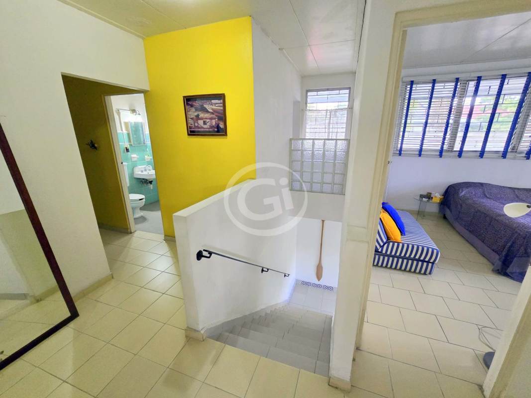 Large terrace with tile floor and garden views in house for sale Diablo Heights Panama City