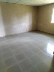 Minimalist kitchen with cabinet, sink and hall access in Guadalupe Hills rental