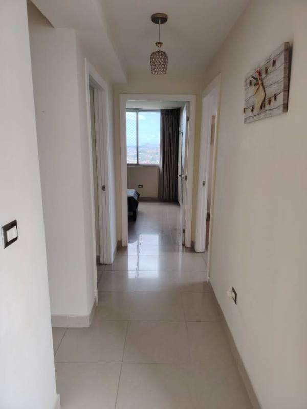 Contemporary bedroom with AC, fan, closet, city views at PH Rokas Condado del Rey Panama