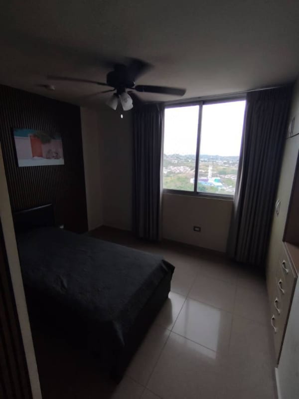 Bathroom with glass shower enclosure, vanity, storage, and mirror in PH Rokas Condado del Rey Panama