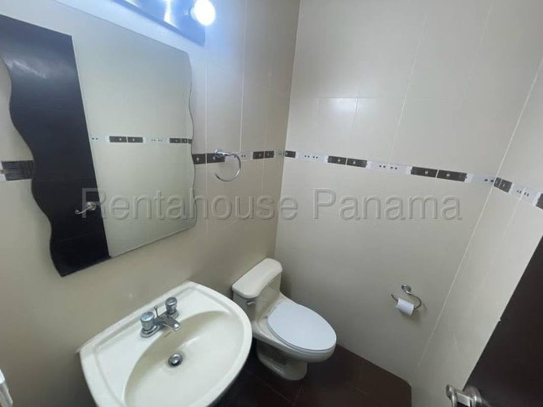 Modern kitchen with granite countertops, stainless appliances, electric stove in PH Bayfront Avenida Balboa