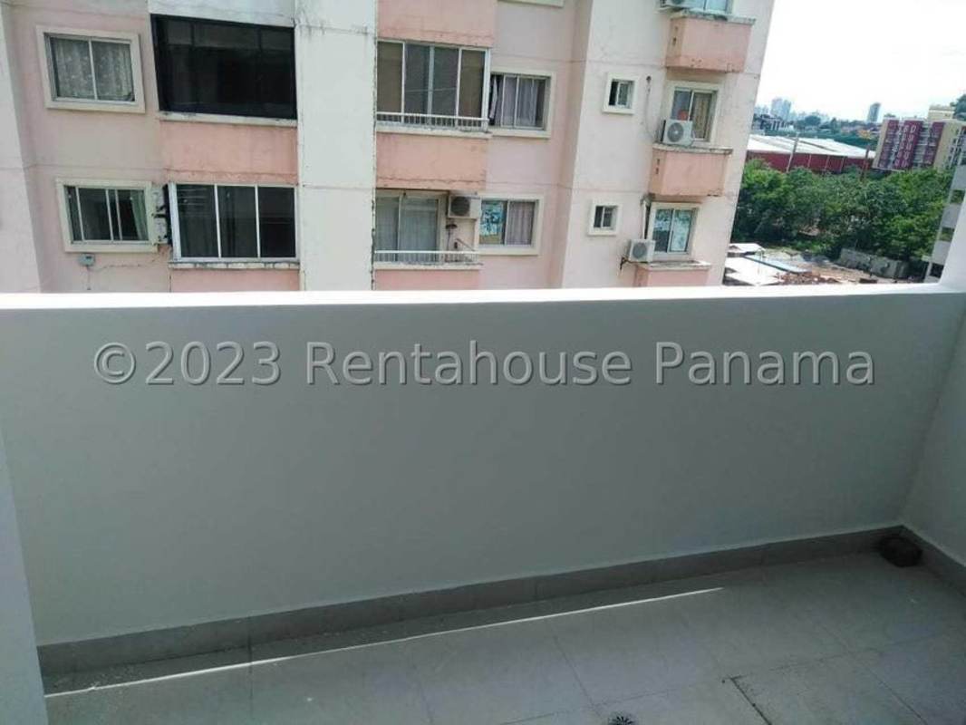 Compact kitchen with granite breakfast bar in Condado del Rey apartment for sale in Panama
