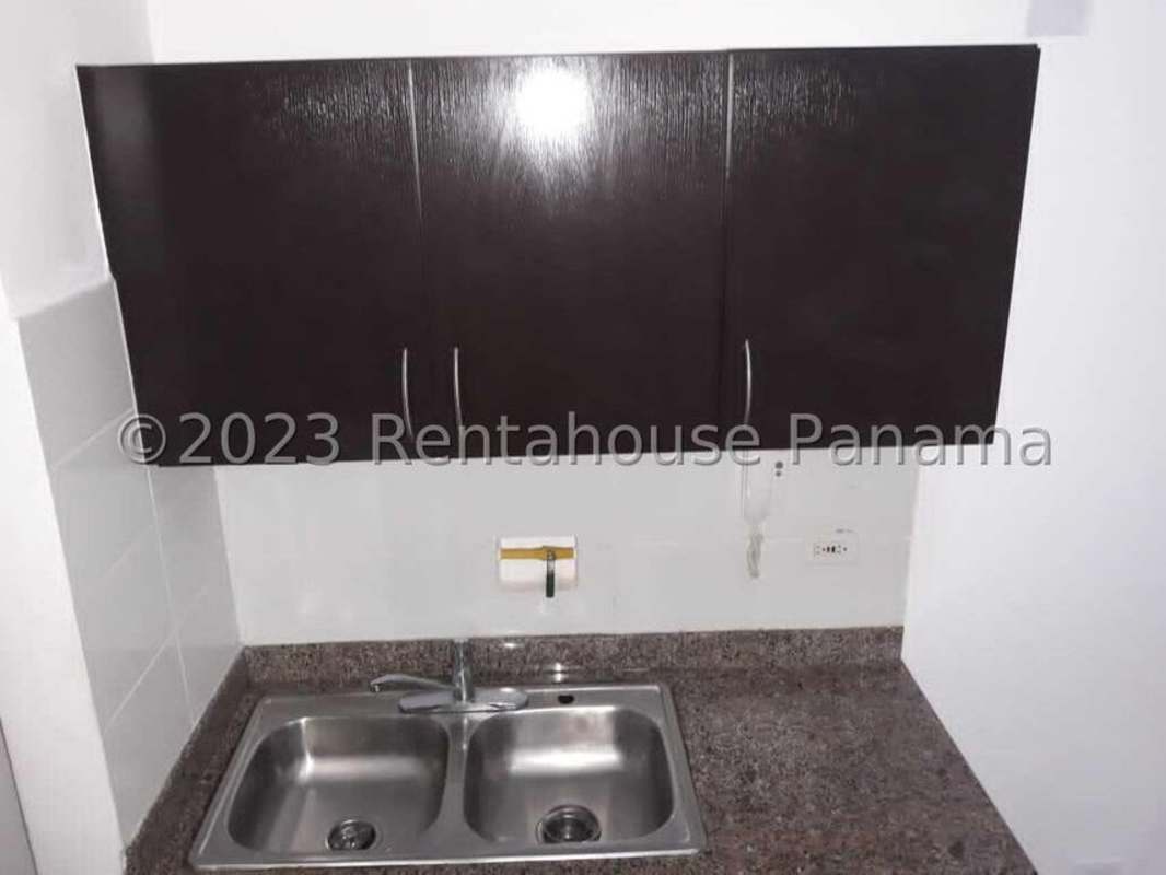 Modern bathroom with granite countertop and walk-in shower Condado del Rey Panama