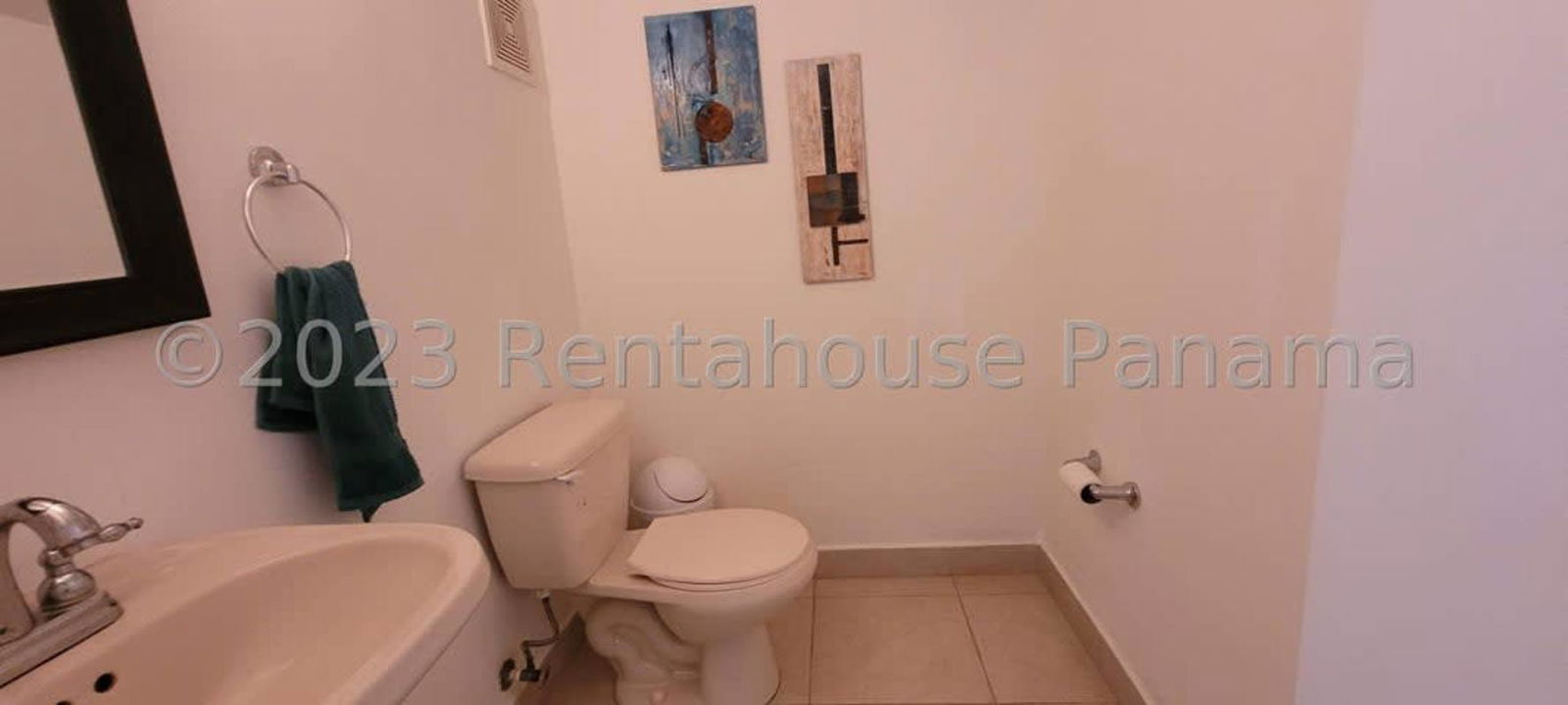 Large kitchen with granite countertops, cabinetry and appliances in PH Versalles Costa Sur Panama