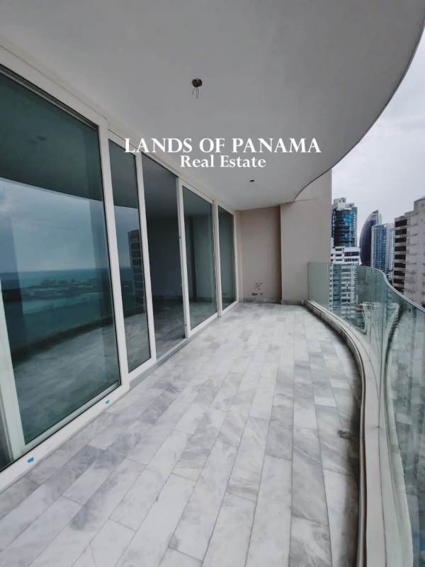 Spacious living room with marble flooring at luxury condo PH The Towers Punta Paitilla Panama City