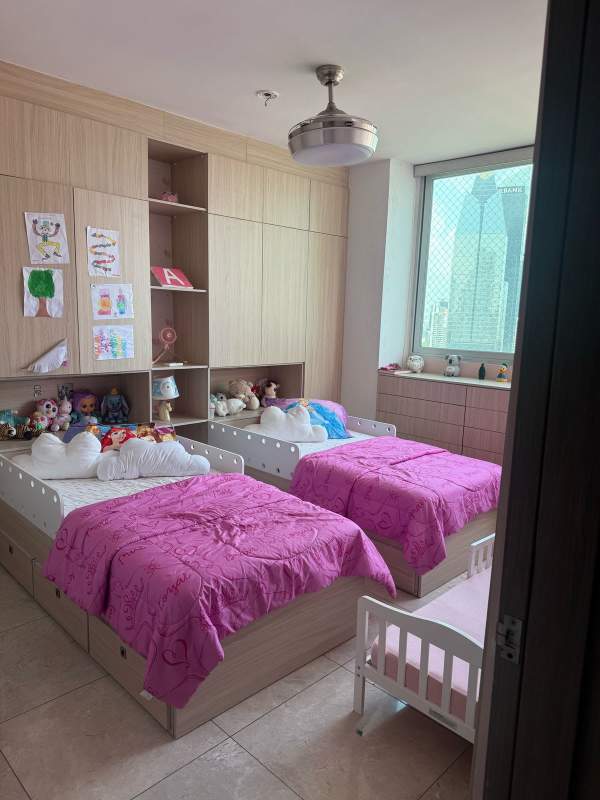 Master bedroom with ocean view large windows and ensuite bathroom in PH Costanera Panama