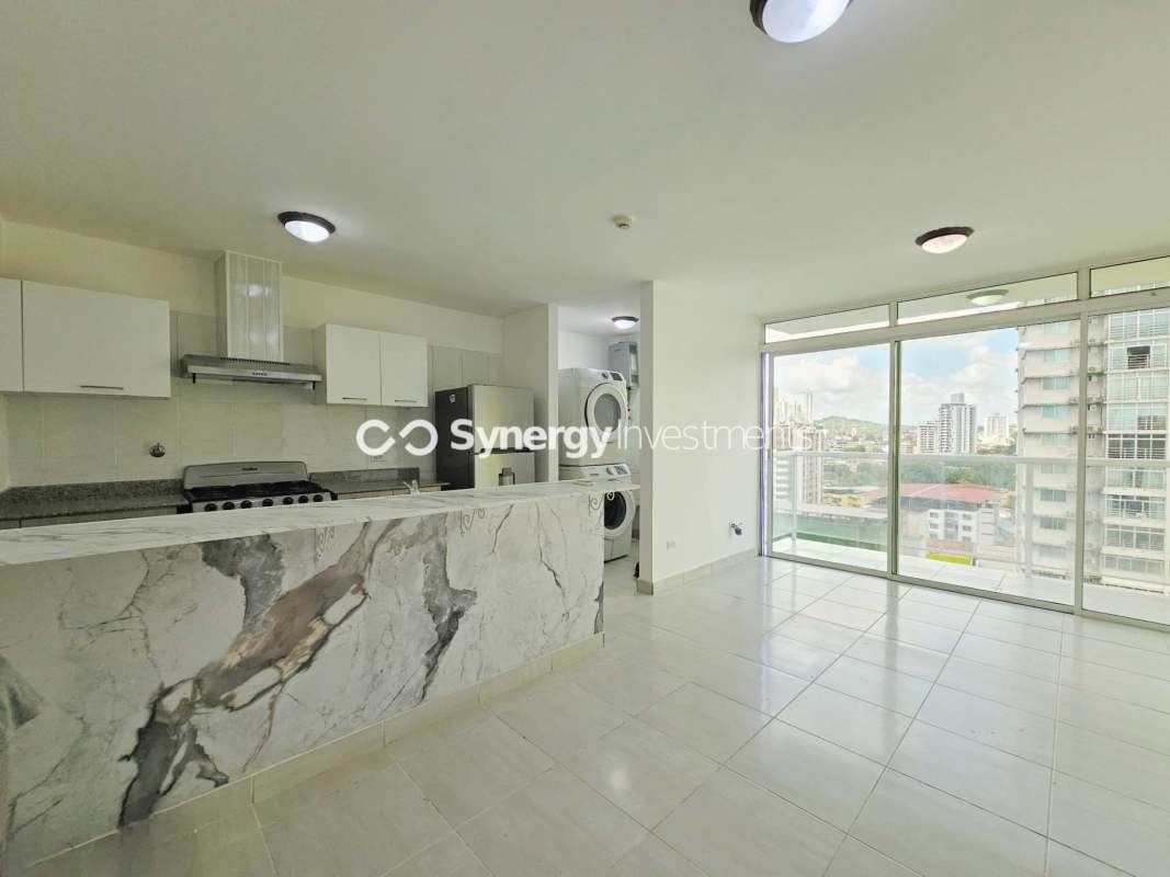 Dining and kitchen area with large windows PH Sky Point Tower for rent Panama City