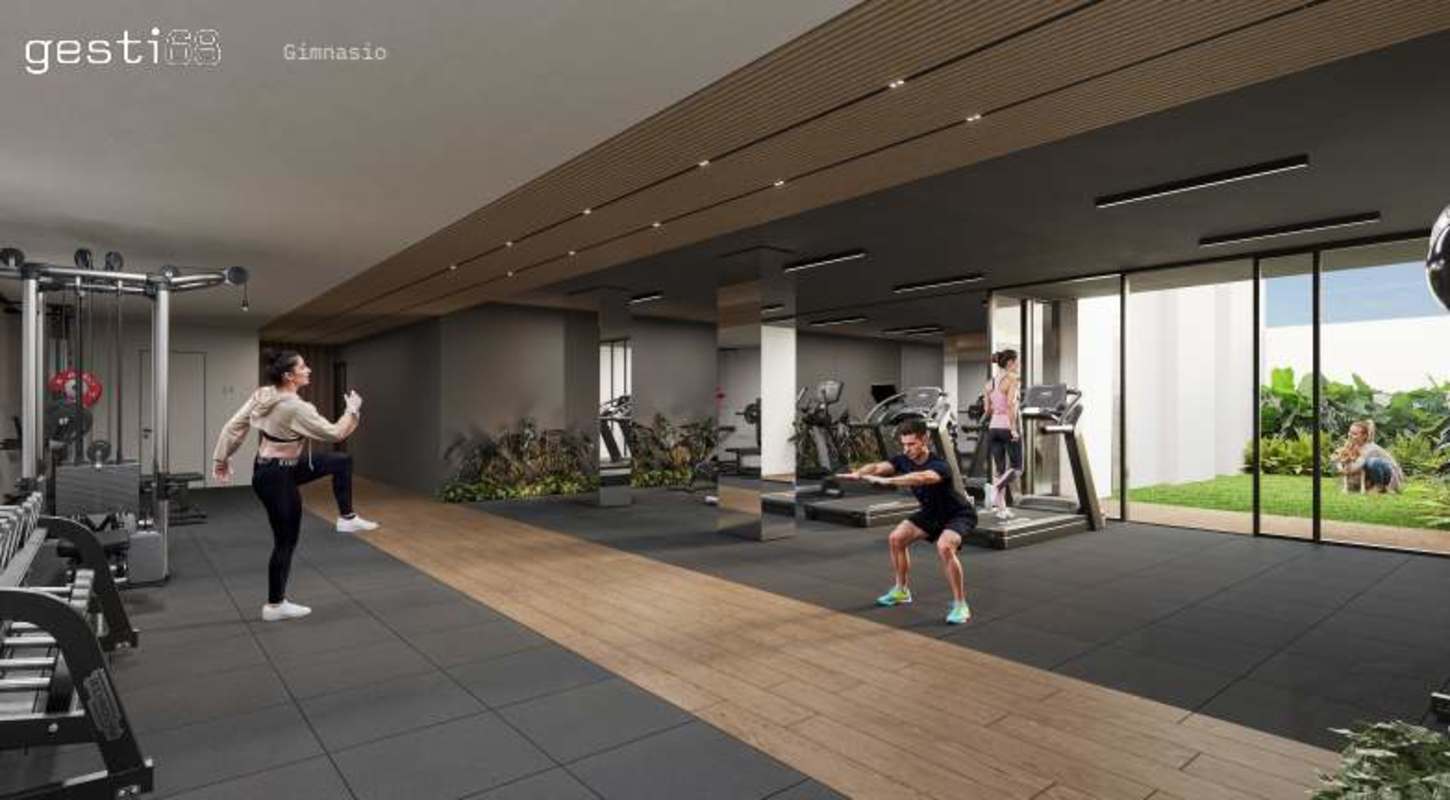 Modern fully-equipped gym facility with cardio and weights at Gesti68 Tower Panama City