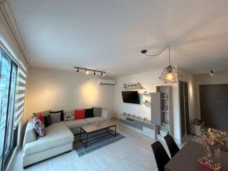 Modern bathroom with walk-in glass shower PH River Valley Panama Pacifico
