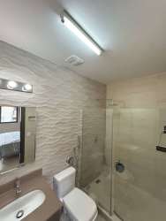 Bedroom with large windows and green view PH River Valley Panama Pacifico