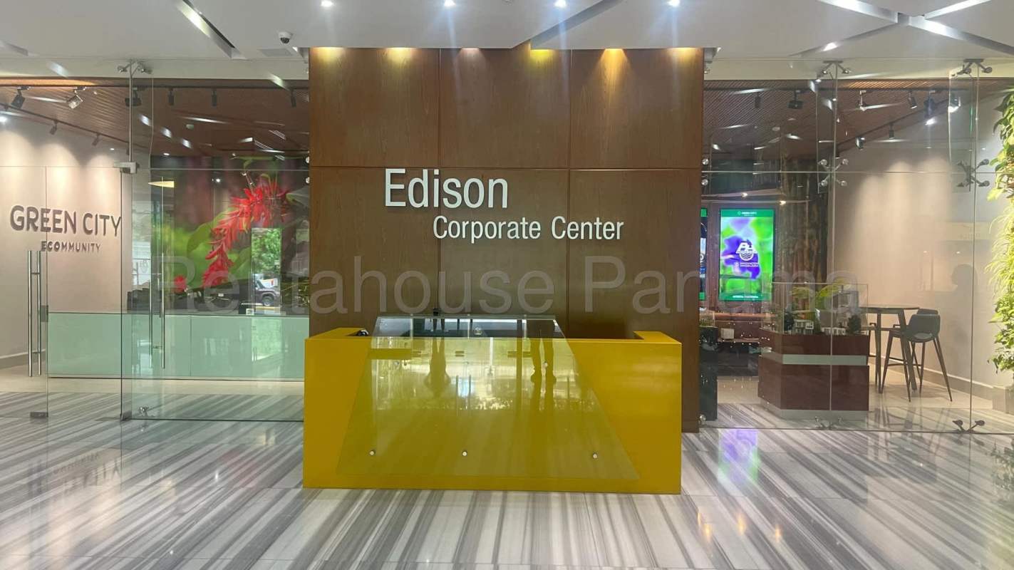 Contemporary high-rise corporate tower with geometric glass facade Edison Park Panama