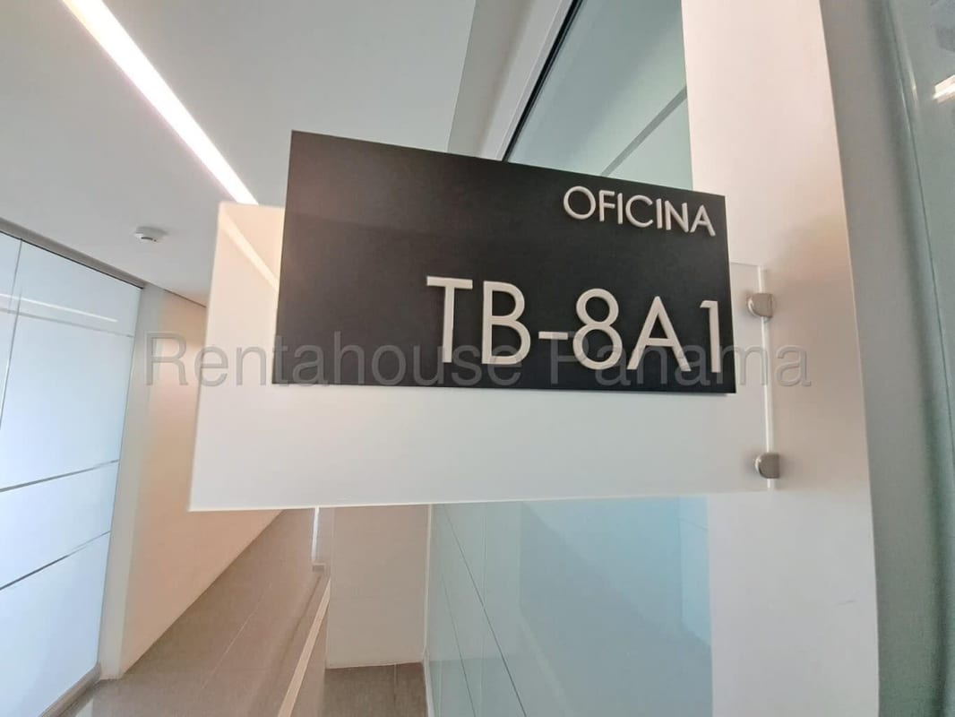 Bright open office space with corner windows tiled floors Edison Corporate Center Panama