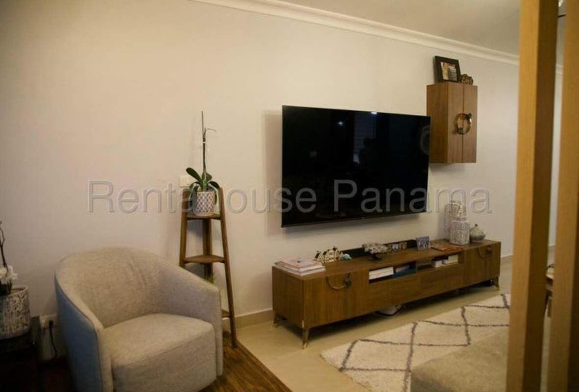 Master bedroom with built-in closet and skyline view in Punta Pacífica Panama
