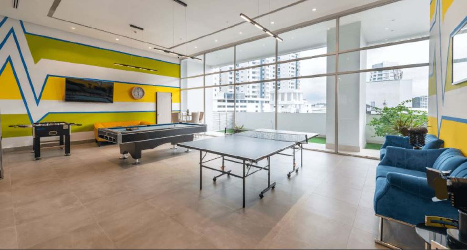 Fully equipped gym with cardio, weights, and city view in PH Vivendi Green