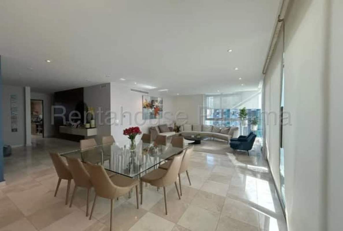 Master bedroom with large windows, walk-in closet and ocean view in PH Pacific Village Punta Pacifica Panama