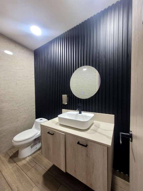 Infinity pool overlooking ocean and city skyline at PH Terramar San Francisco Panama