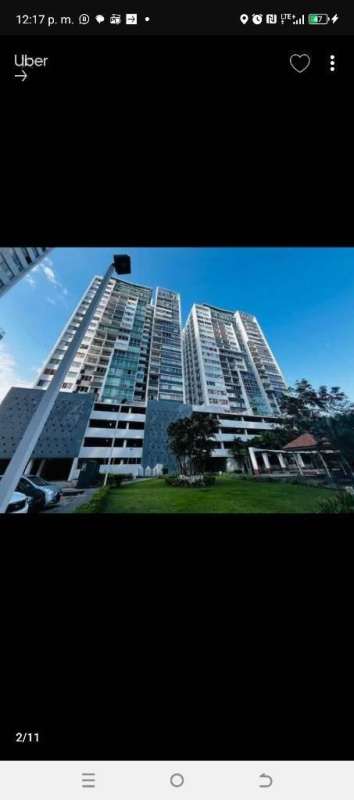 Multiple high-rise residential towers, pool, gardens PH Central Park Panama