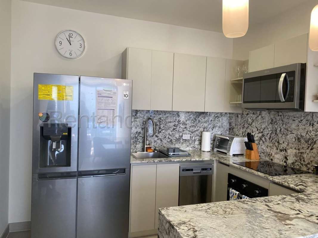 Kitchen with granite countertops, modern cabinetry, and stainless appliances in PH Oceana Costa del Este Panama