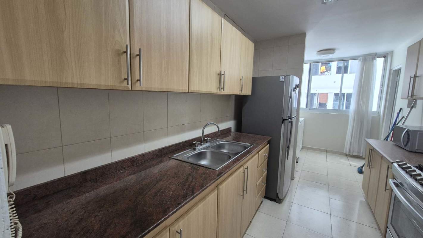 Granite countertop kitchen with natural light PH Aurora Tower El Cangrejo Panama