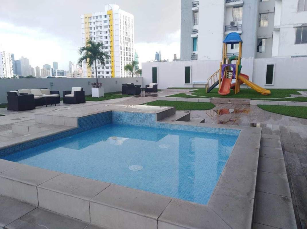 Swimming pool with deck and lounge at PH Vía España Tower Obarrio Panama