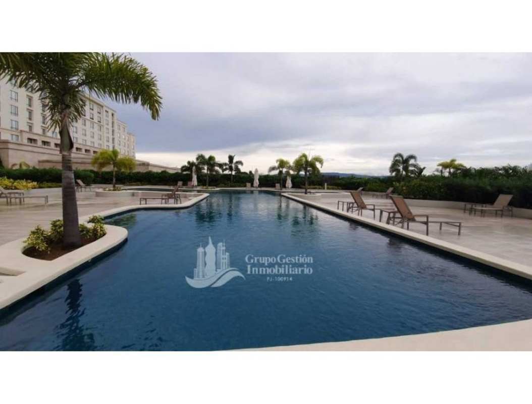 Luxury infinity pool surrounded by palm trees at Santa Maria Golf & Country Club Panama