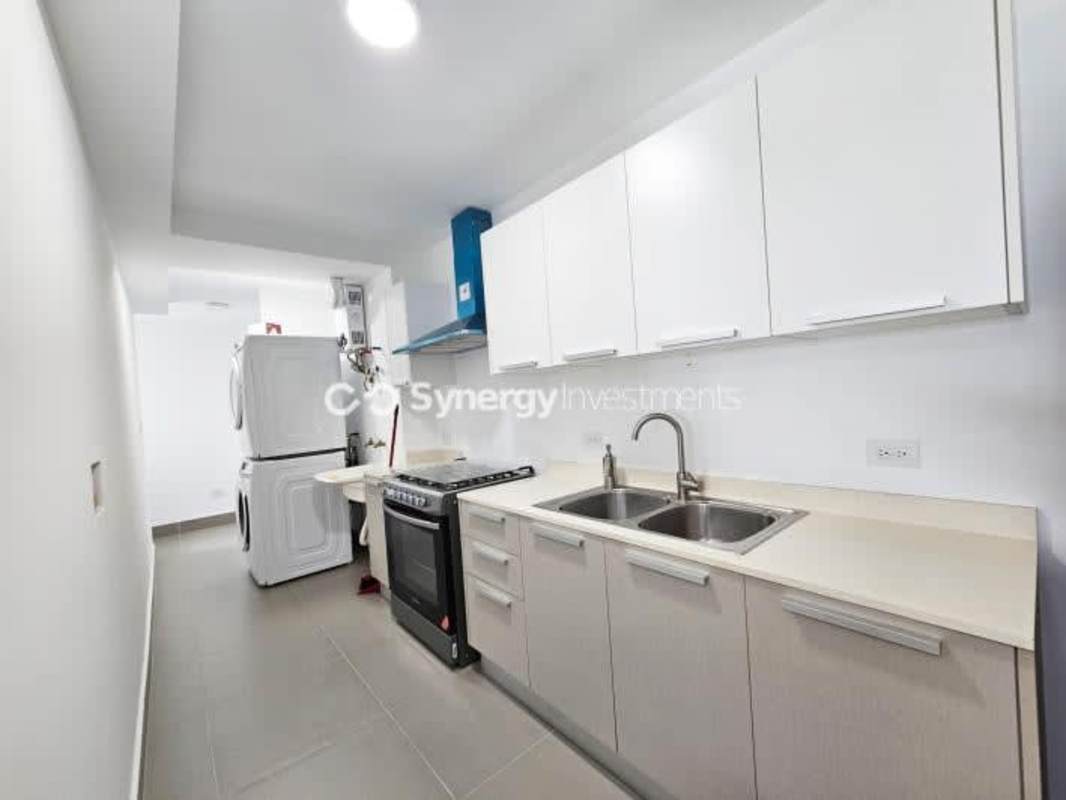 Bright recreation and TV lounge with pool and ping pong table at PH Aqualina Bella Vista Panama