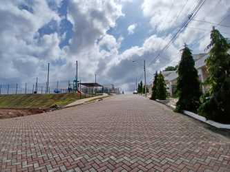 Bright open-concept living dining space with porcelain tile and modern lighting Nuevo Arraiján