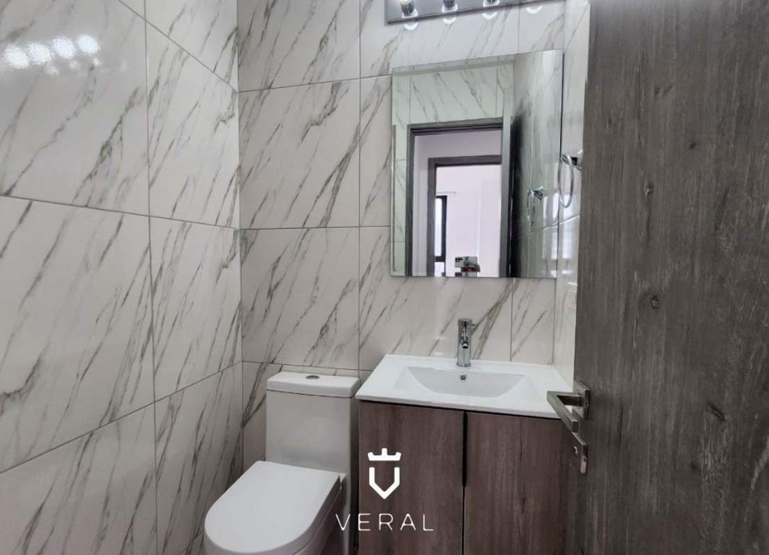 Modern kitchen granite countertop appliances marble floor PH The Grey 1BR rental