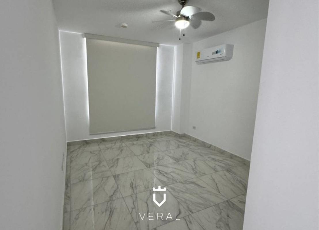 Bedroom marble floor large window downtown view PH The Grey Calle 50