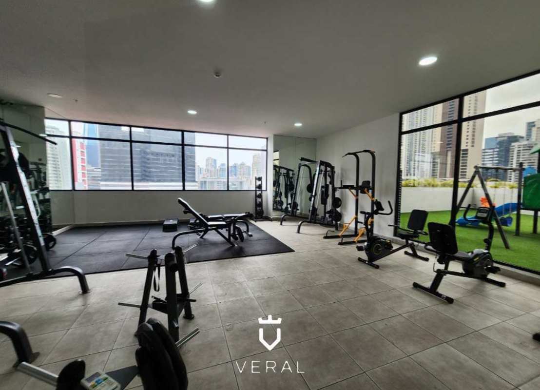 Fully equipped gym skyline view large windows PH The Grey Calle 50