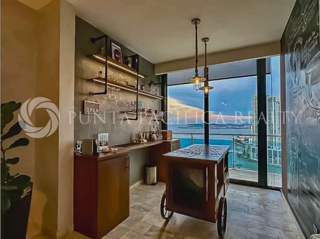 Luxurious bathroom with double sinks, glass shower, marble finishes in Punta Pacifica condo