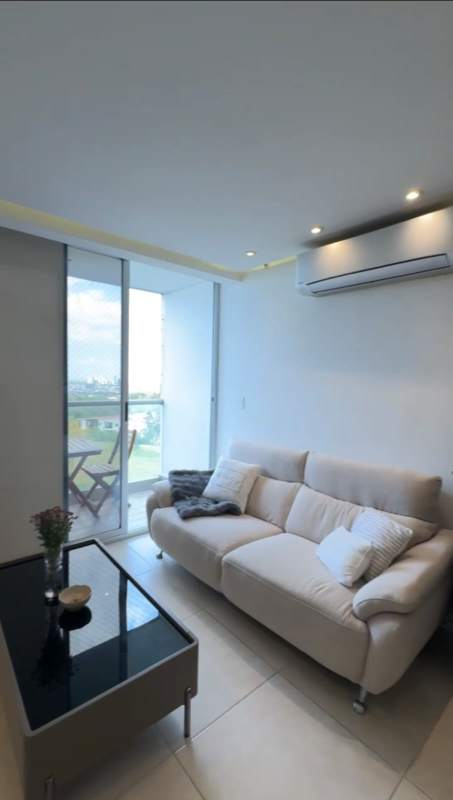 Renovated bathroom with glass shower and vanity in PH Sky Point Panama City