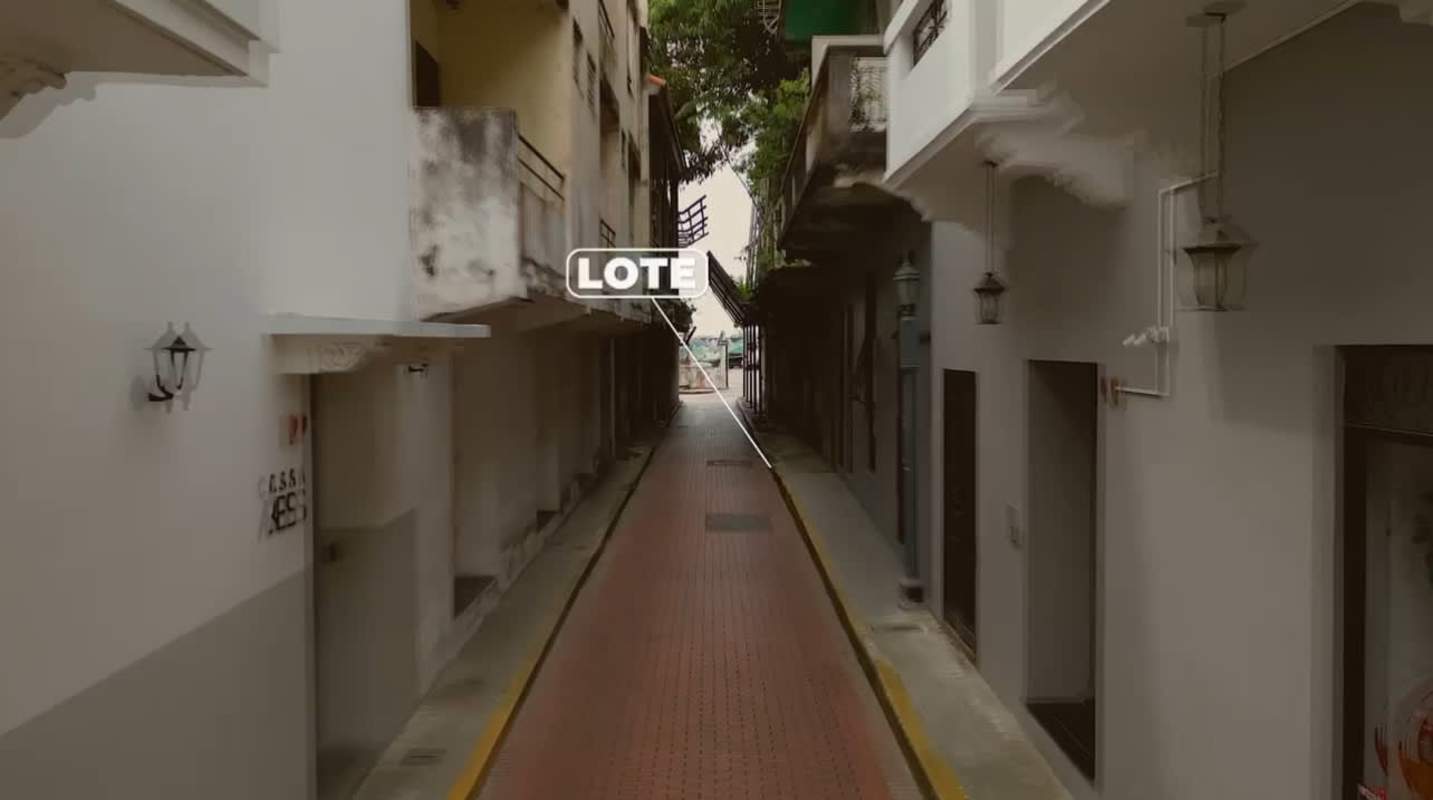Narrow street view colonial facades lot location Casco Viejo