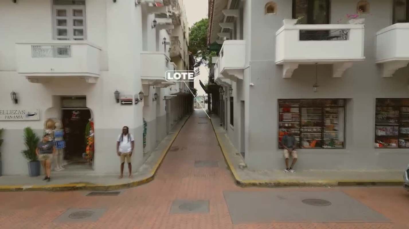 Alleyway with retail ground floors and balconies Casco Viejo