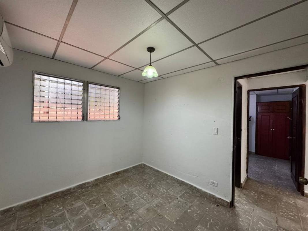 Covered front terrace with decorative railing at house for sale Colinas del Prado Juan Díaz Panama