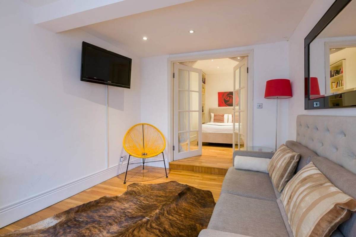 Modern kitchen with breakfast bar and dining space in Yoo Panama for rent