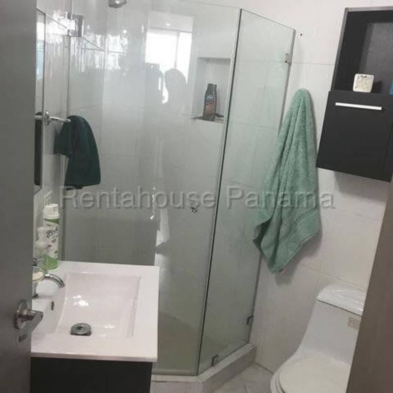 Luxury bathroom with mosaic tiles, jacuzzi tub, glass shower in PH El Cangrejo Panama