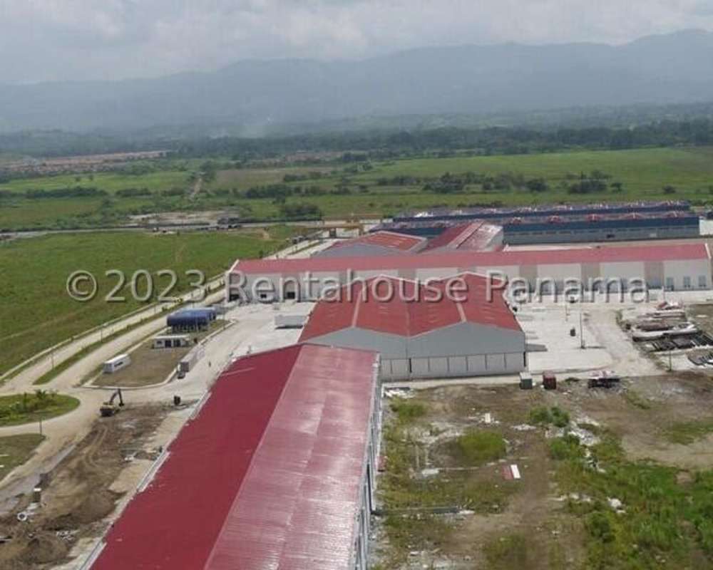 Main entrance security checkpoint Parque Industrial Americas blue signage Panama