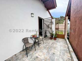 Bright living and dining room in La Chorrera house with tile floors and window