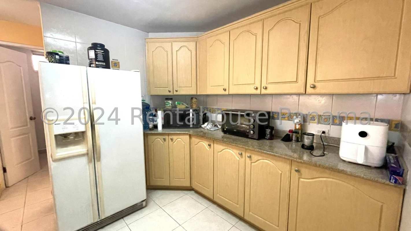 Master bedroom in family house for sale at Condado del Rey Panama City with large window and closet