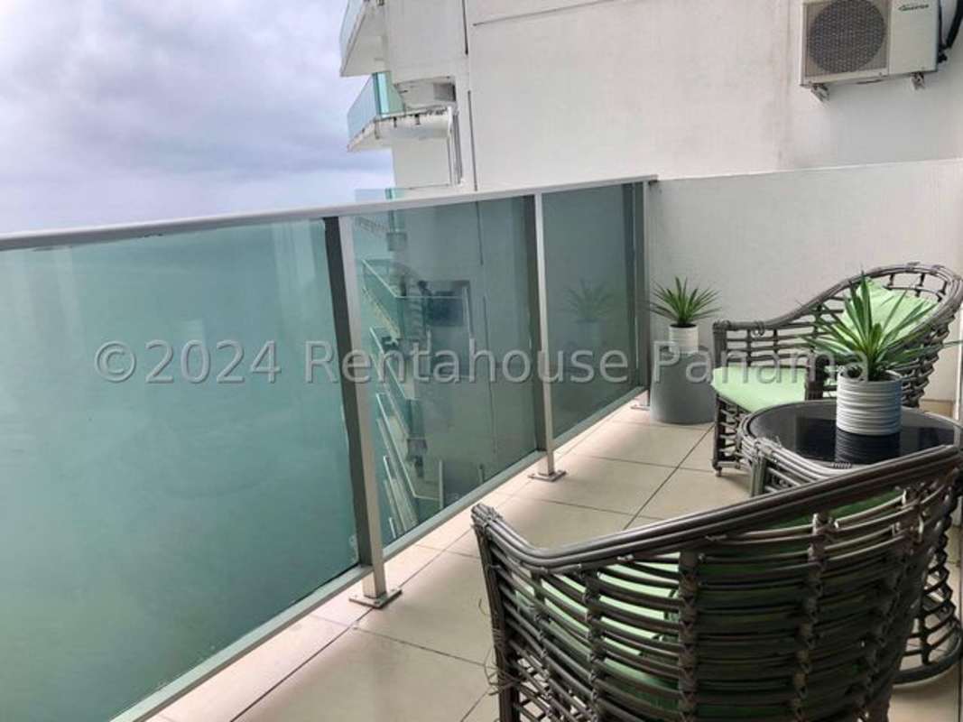Glass rail balcony overlooking Pacific Ocean in PH Ocean Club Panama apartment