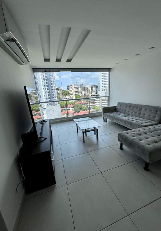 Kitchen with granite counters, appliances washer dryer, and city view PH Via Argentina Panama City