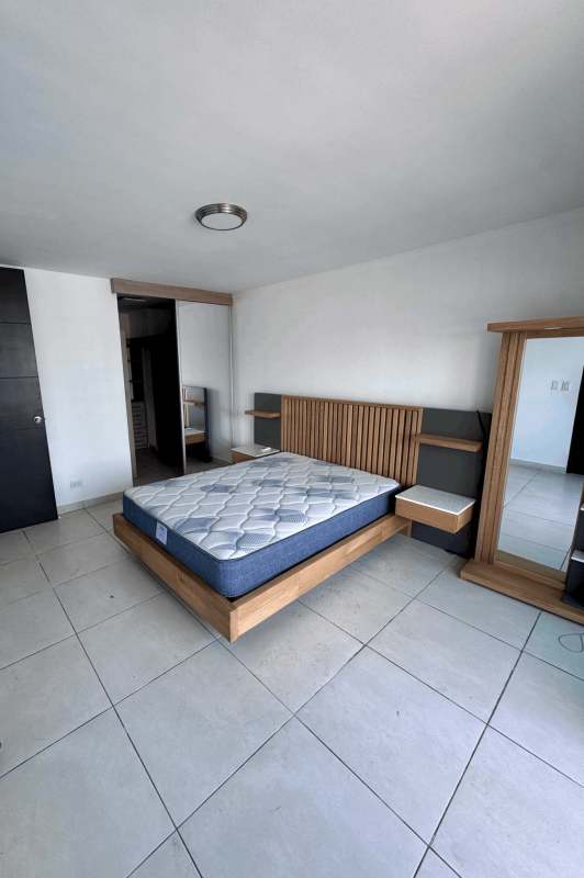 Bright bedroom city view split AC built-in closet furnished PH Via Argentina Panama