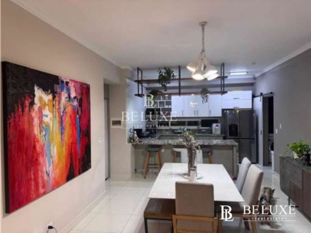 Open plan kitchen and dining room with granite countertop PH Nautica Tower Coco del Mar