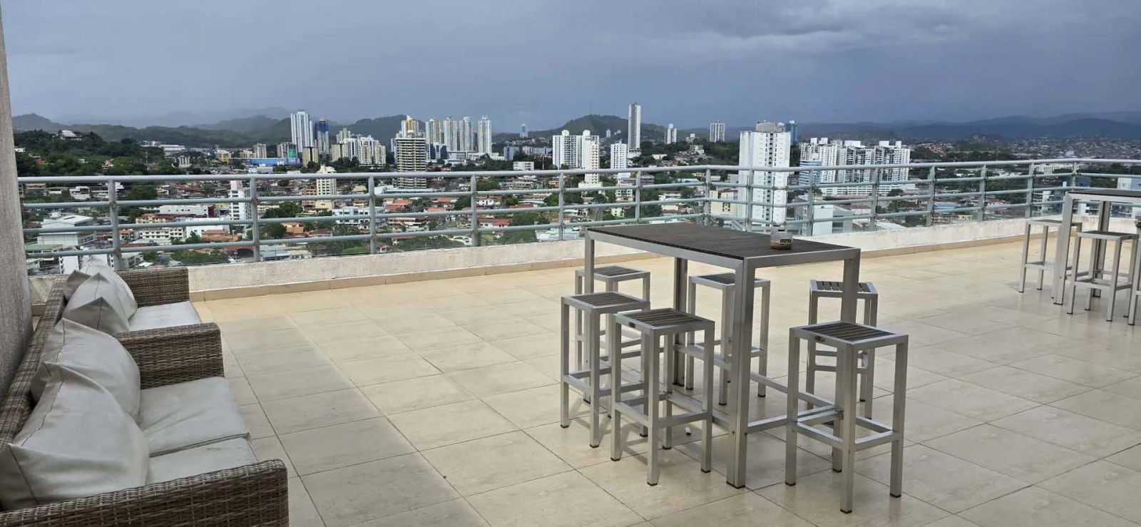 Modern rooftop terrace lounge with skyline view at PH Macedonia Towers El Ingenio Panama