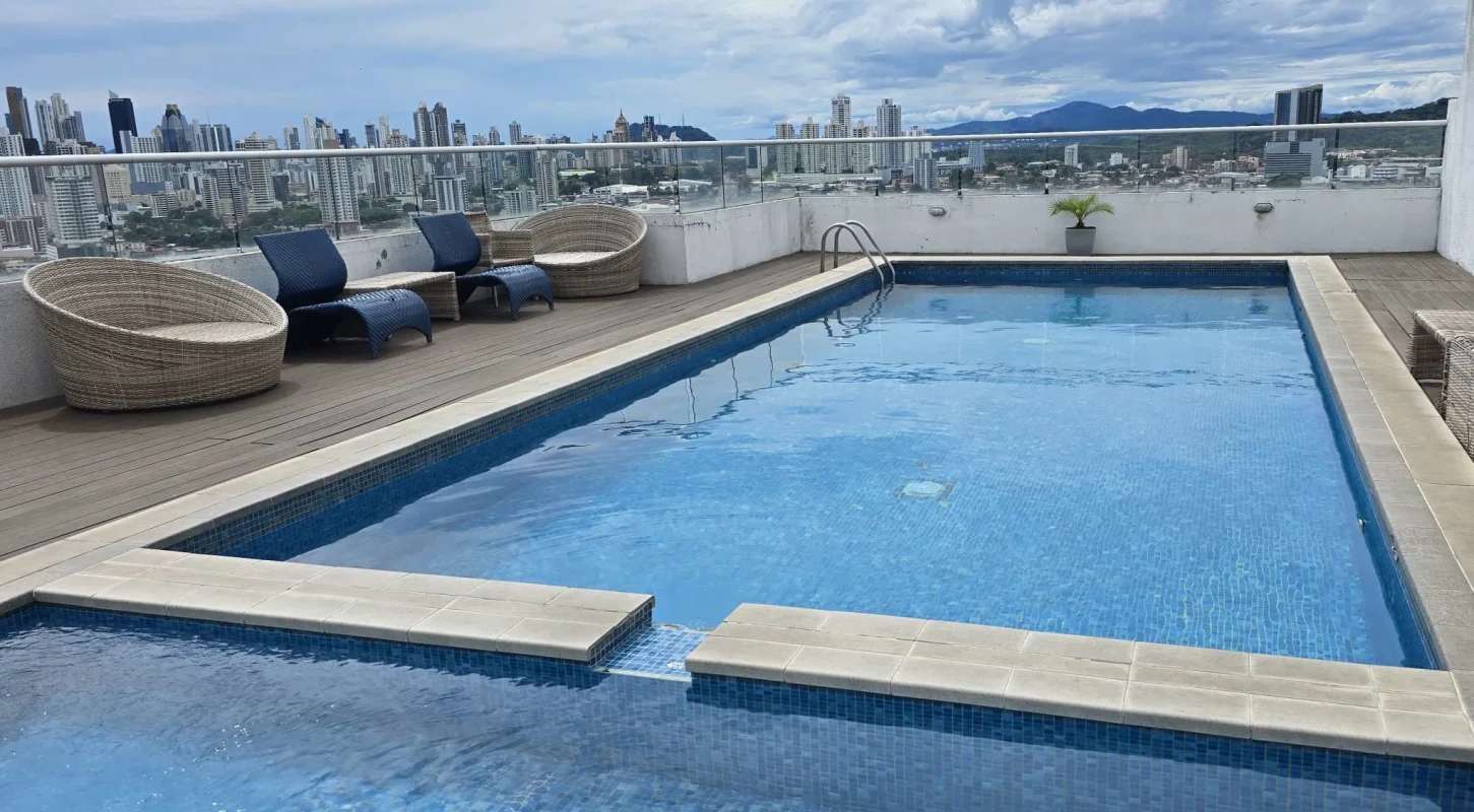 Infinity pool on rooftop overlooking Panama City skyline at PH Macedonia Towers El Ingenio